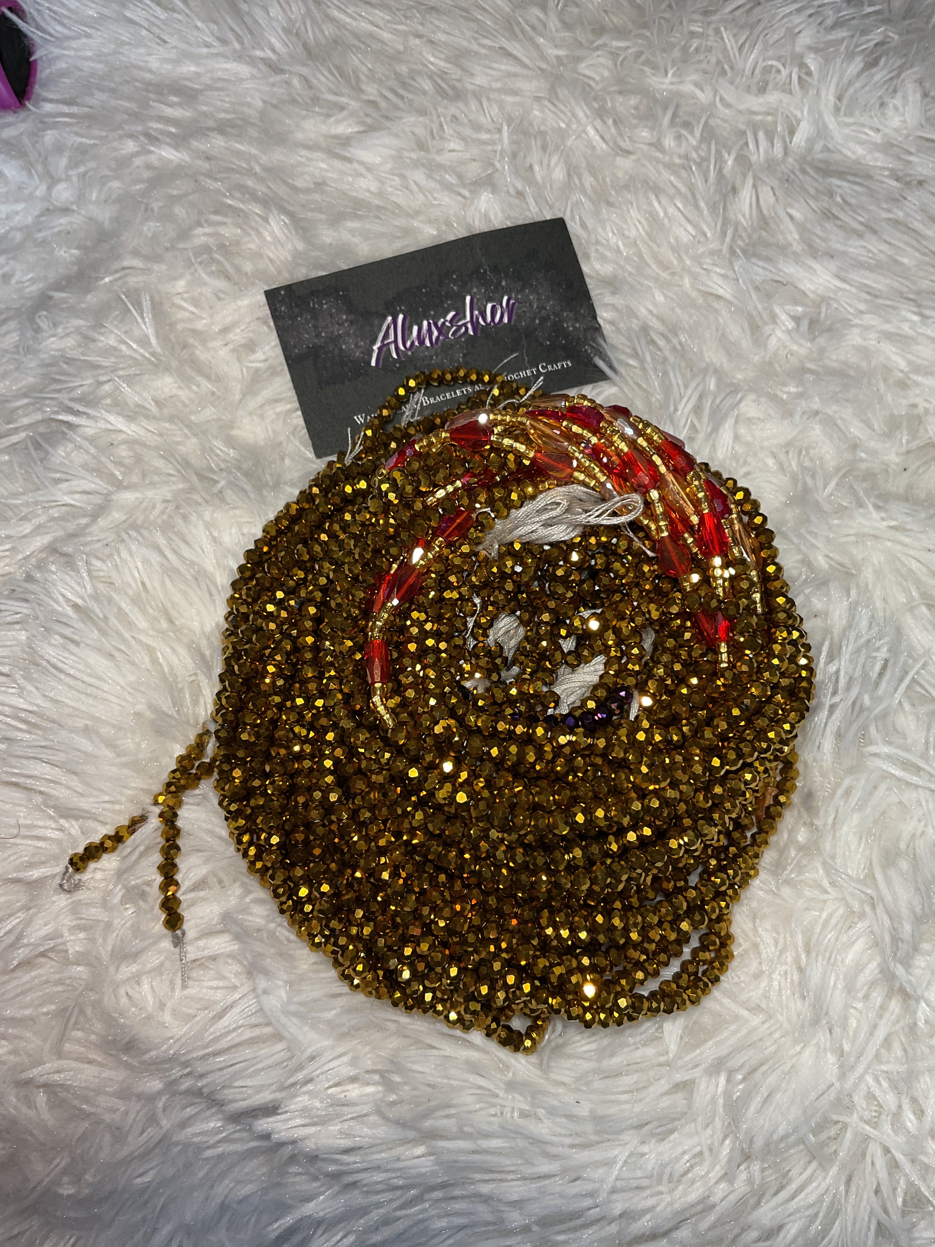 Brown red gemmed beads