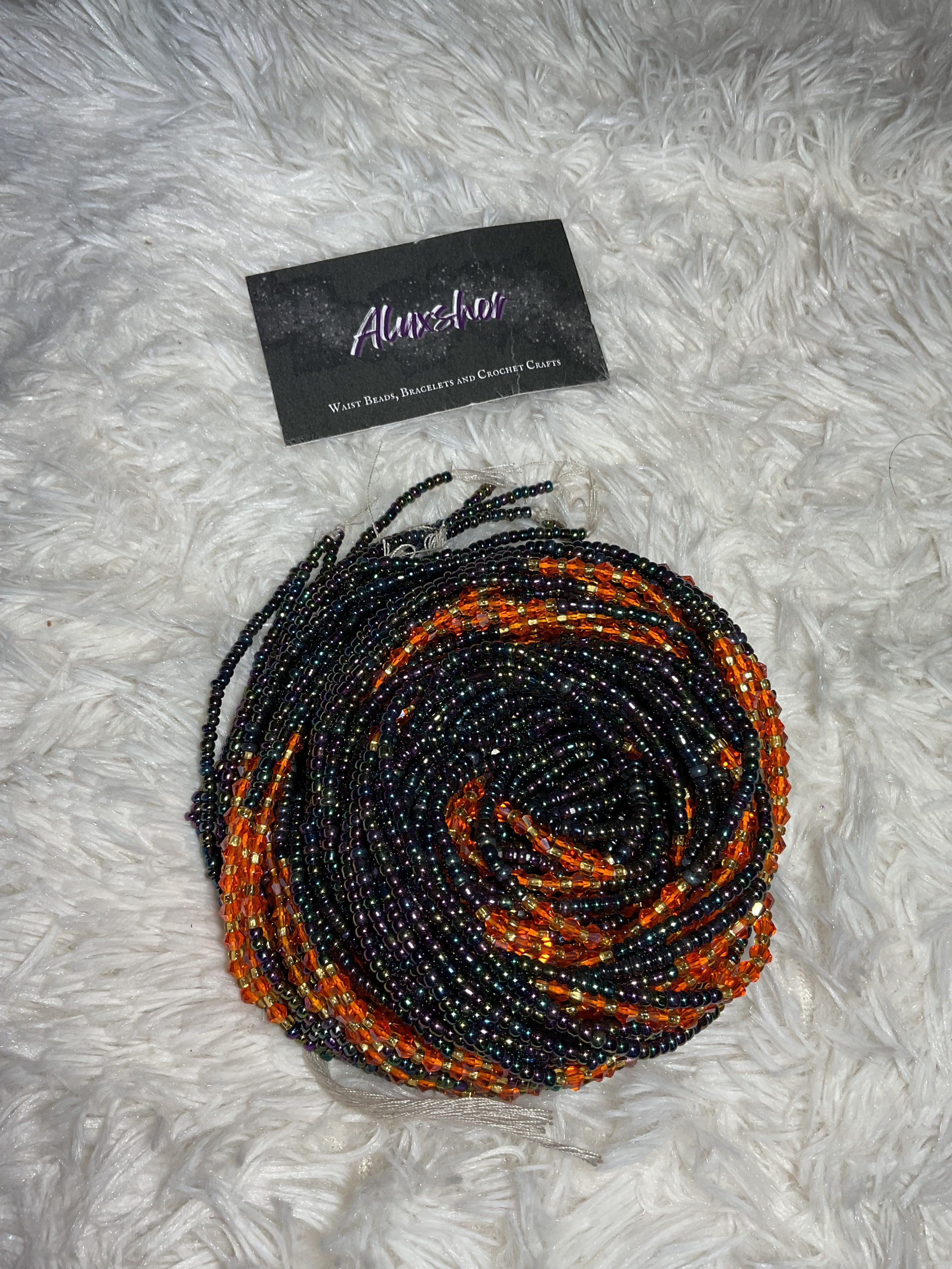 Black multi color gemmed beads