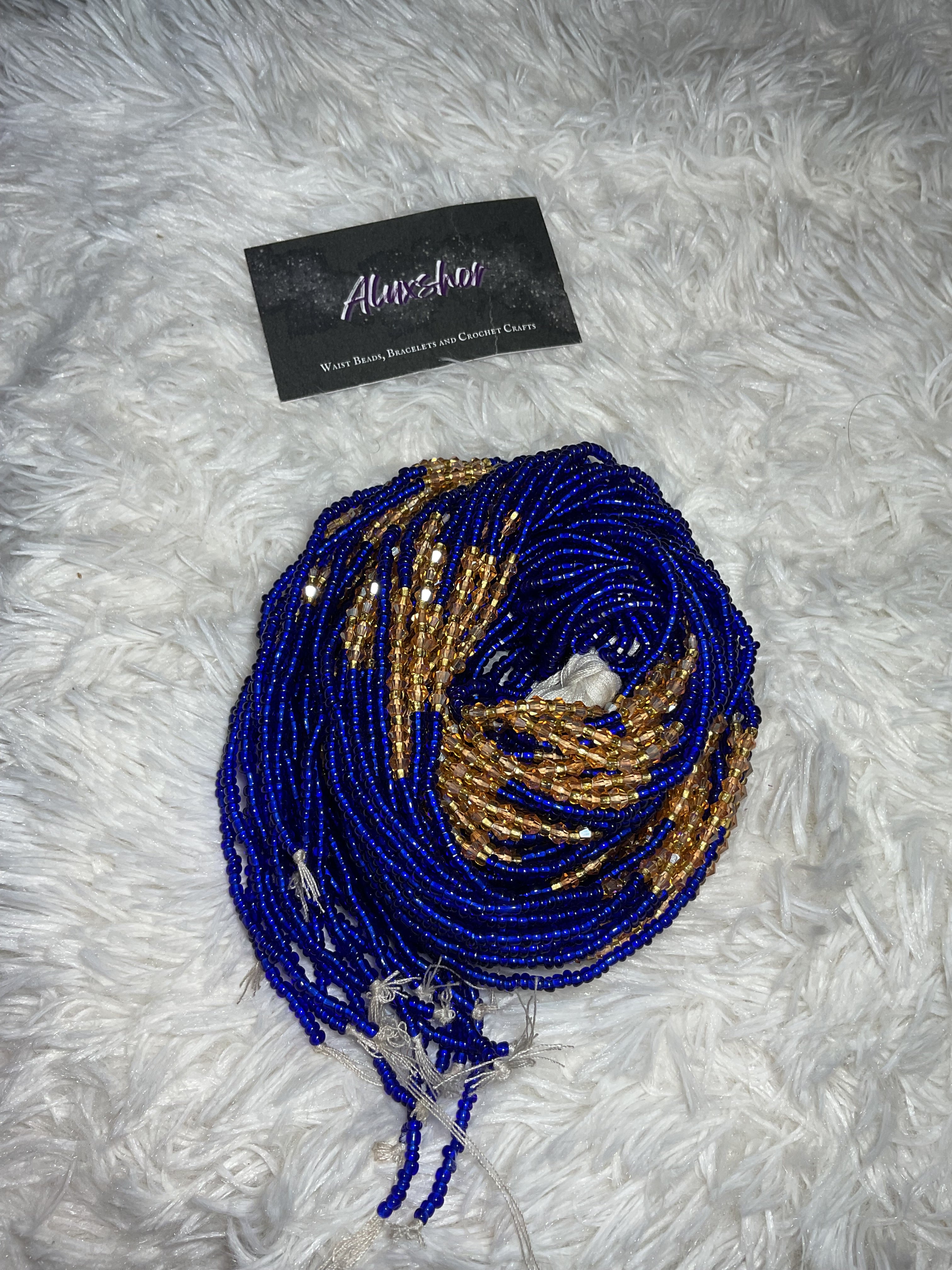Blue gold gemmed beads